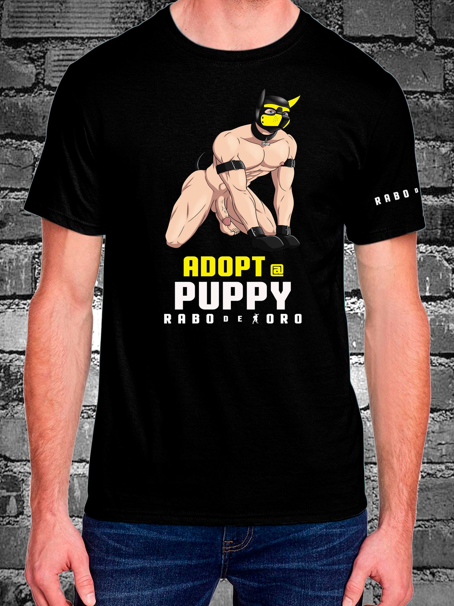 Express your inner pup with this Rabo De Toro original — a bold black T-shirt made for those who live the fetish lifestyle with humor and heart.
ay puppy fetish t-shirt, adopt a puppy design, kink fashion, fetish menswear, Rabo De Toro clothing
