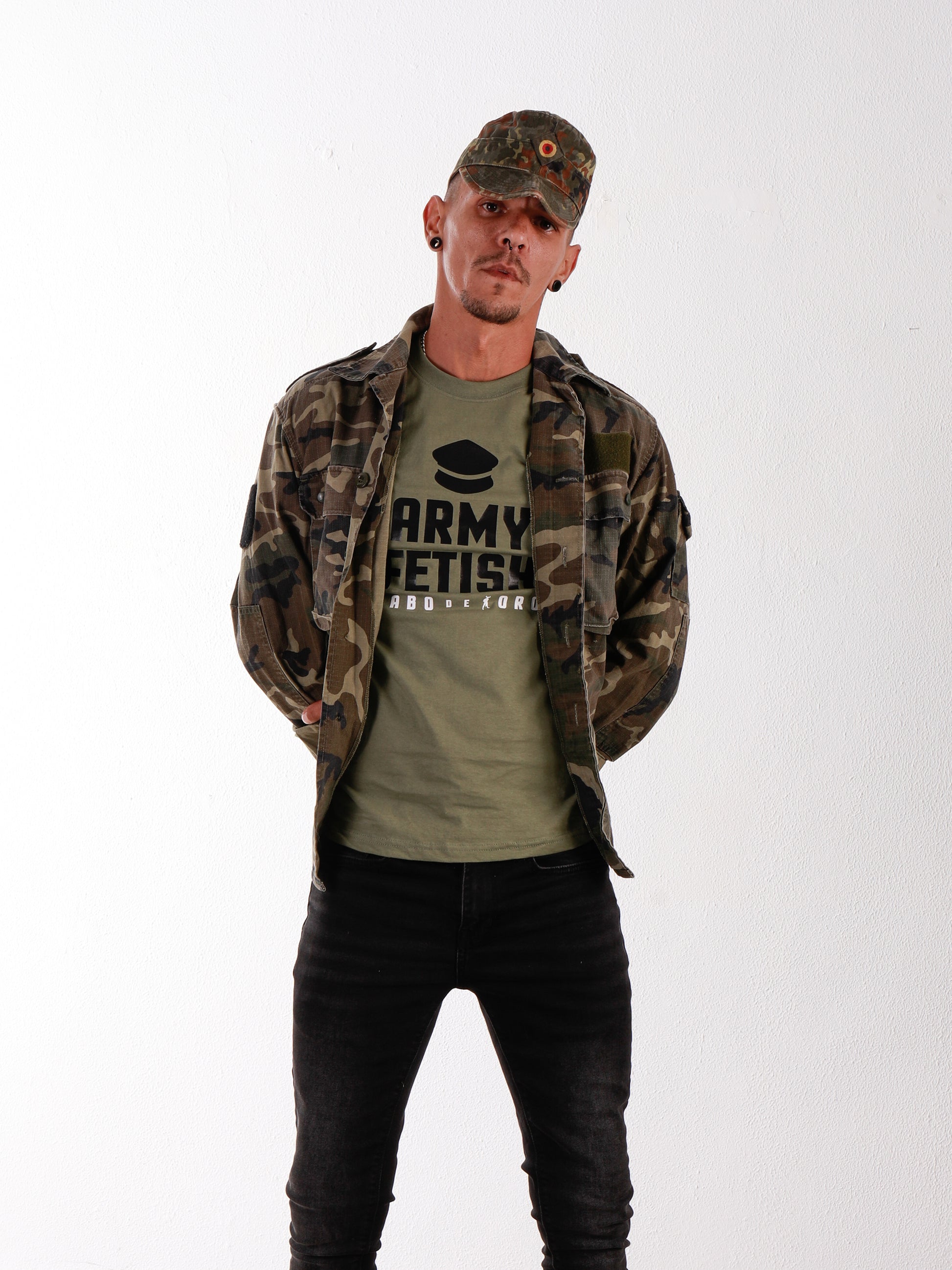 Discover the bold style of Rabo De Toro’s ARMY FETISH T-shirt in olive green. A military-inspired design for confident gay men who own their fetish identity. Soft cotton, sleek fit, and fetish attitude in one. gay fetish t-shirt, army fetish style, olive green tee, Rabo De Toro clothing, gay kink fashion, military gay pride shirt